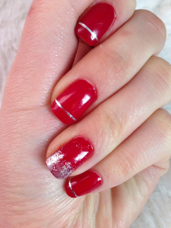 red gel nails for Christmas red fingernails motifs silver