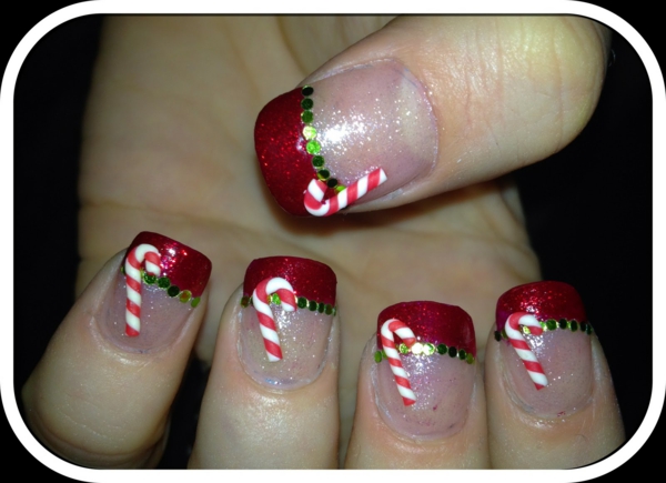red gel nails for Christmas red fingernails motive candy canes