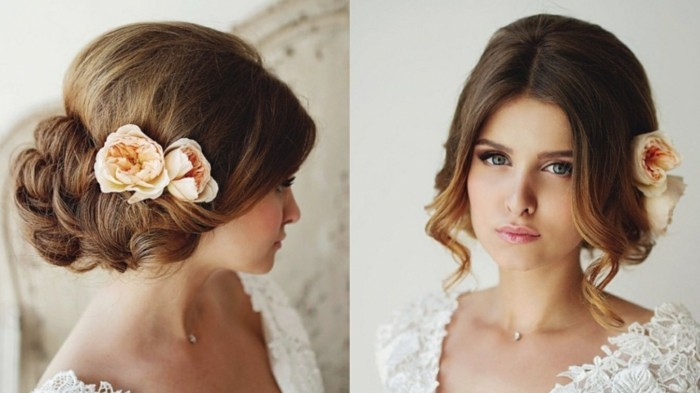 美丽的发型在头发中的婚礼花朵