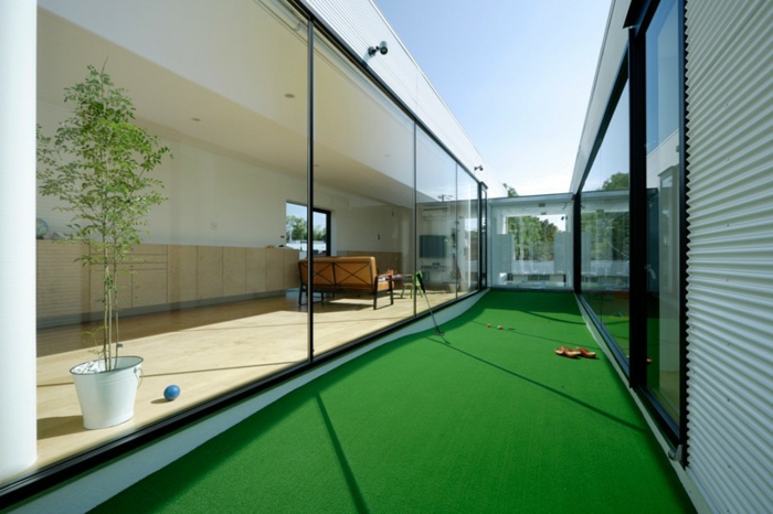 hermosas ideas de vida tienen patio de golf de lujo en el hogar