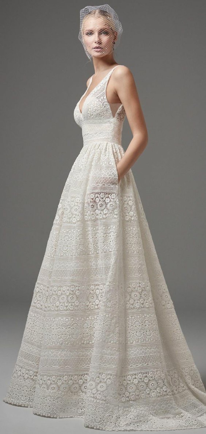 美丽的蕾丝礼服白色波西米亚风格的婚礼想法