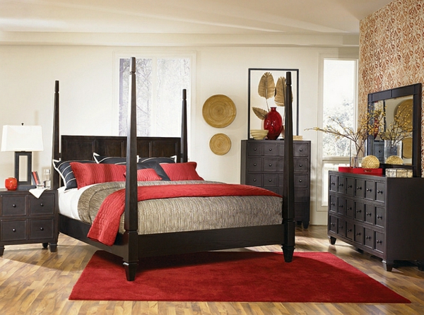 bedroom set up asian dark wood dark red textiles