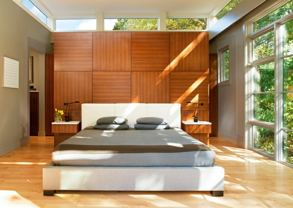 bedroom set up wood wall paneling