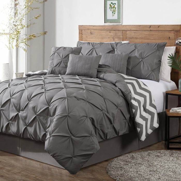 家具的想法灰色卧室灰色寝具圆地毯植物