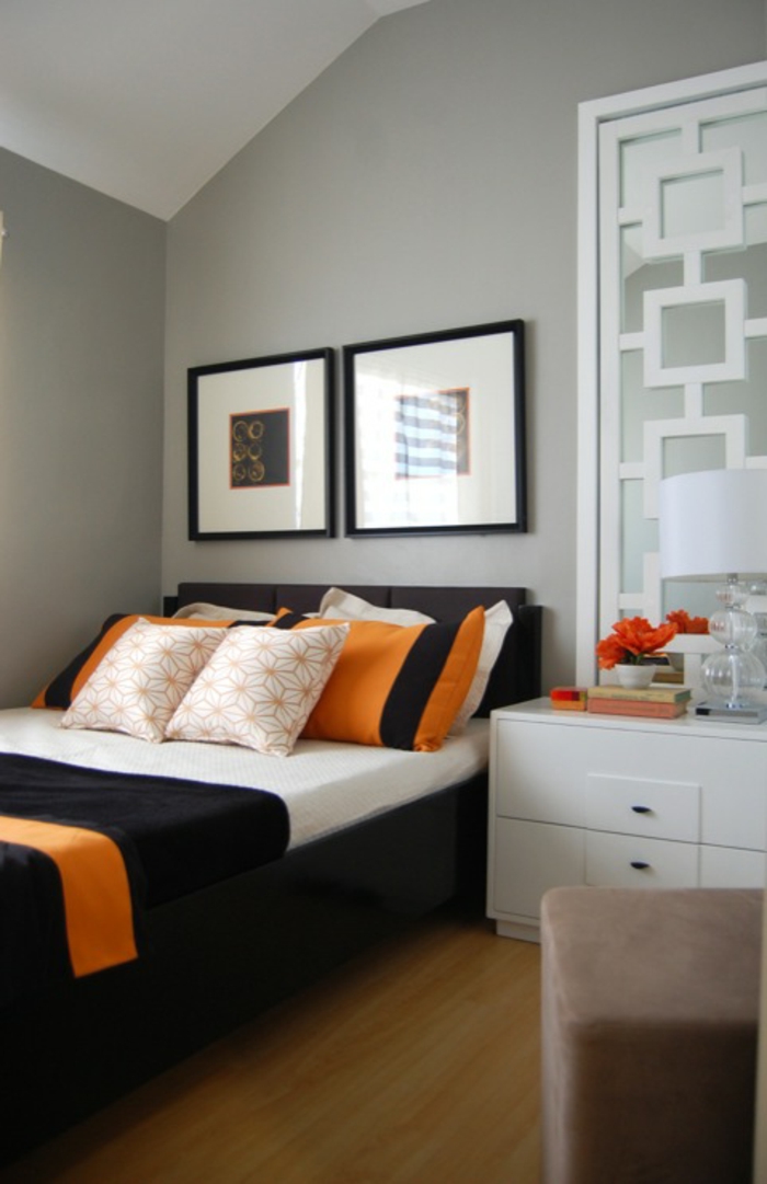 υπνοδωμάτιο γκρι ανοικτό γκρι τοίχο πορτοκαλί ρίξτε μαξιλάρι μαύρο κρεβάτι