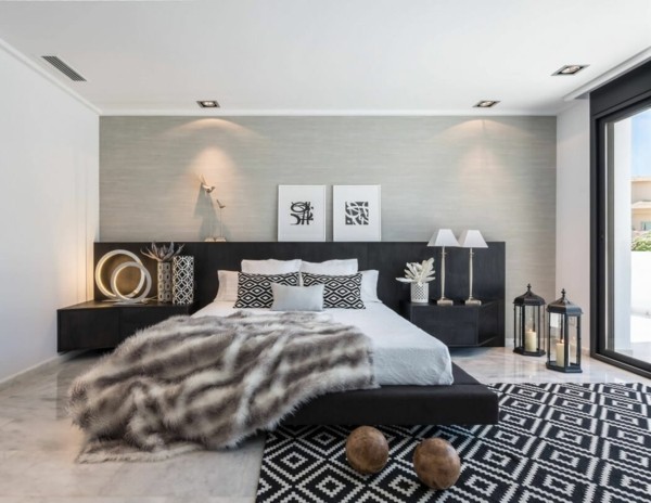 diseño del dormitorio de pared en pared de color gris alfombra de la piel manta de patrón