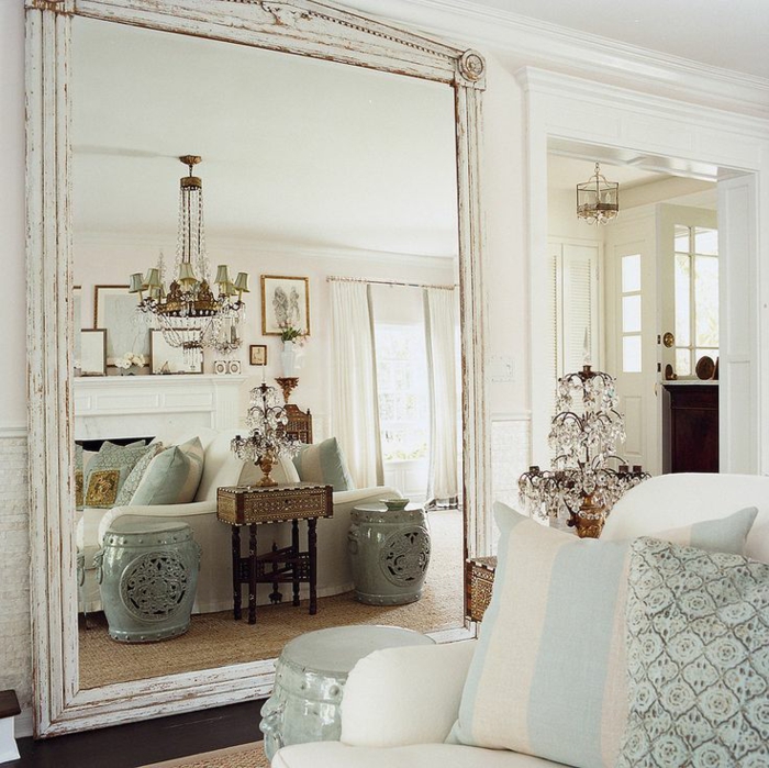 shabby chic living room ideas porcelain stool crystal chandelier side table sisal carpet wall mirror