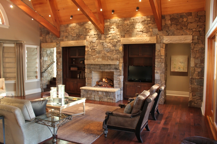 Stone wall living room rural style fireplace ceiling lighting