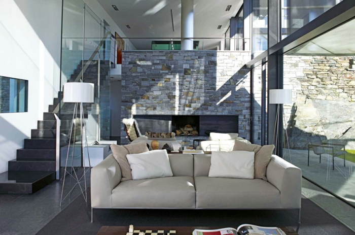 stone wall living room floor lamp interior staircase modern living area