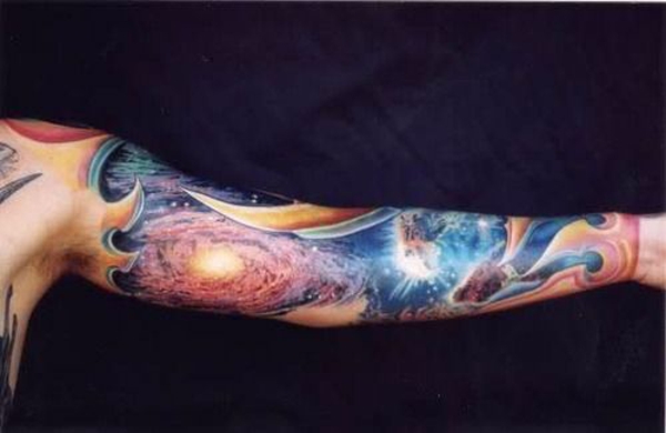 tattoo motifs colorful universe upper arm colors