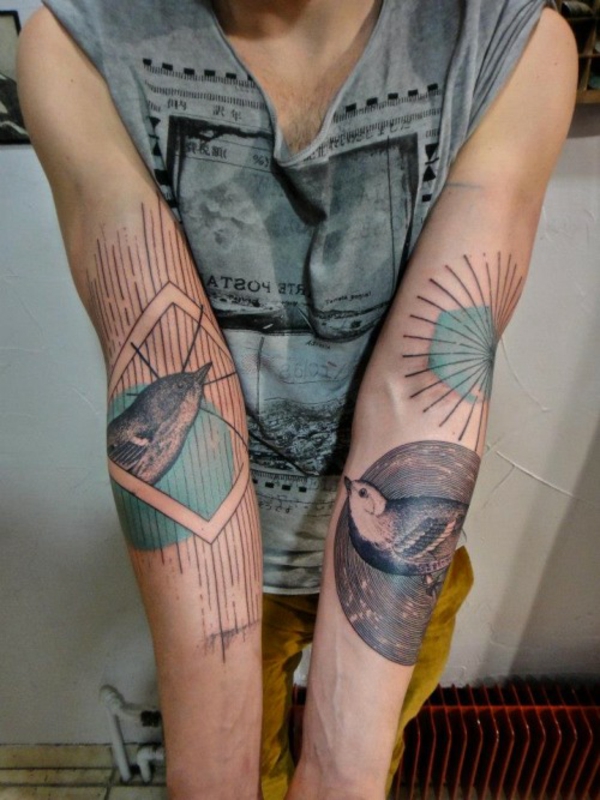 motifs de tatouage bras supérieur conception d'oiseau