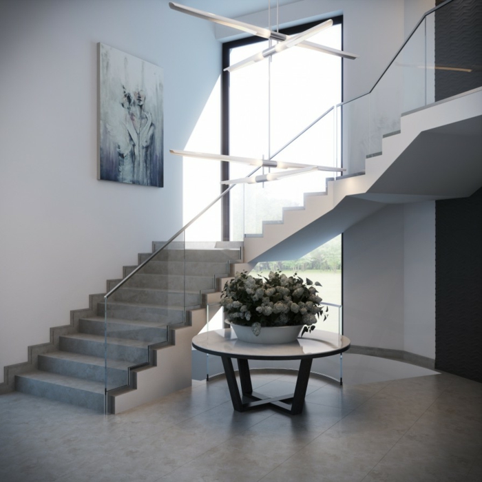 laiptai dizainas stiklo turėklai apvalus staliukas gyvenamasis kambarys prieškambario