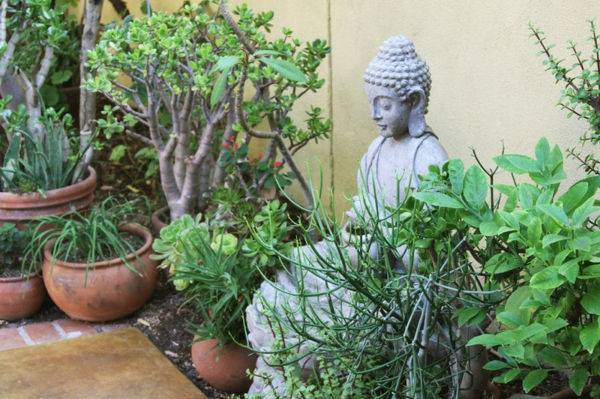 ambiente Buda estatua jardín relajarse espíritu
