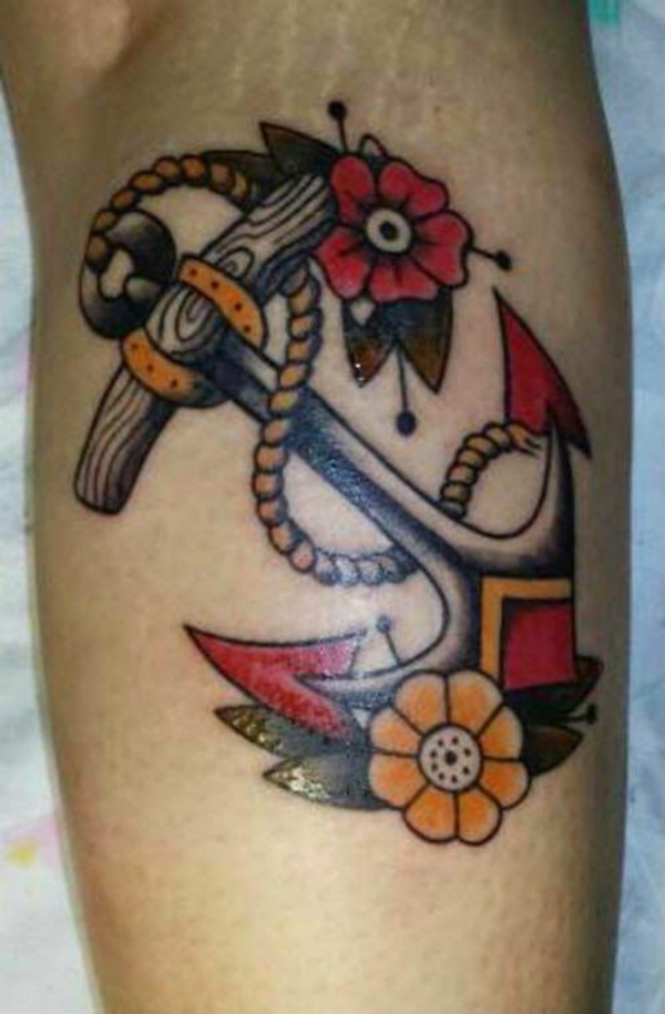 forearm tattoo men motives flowers anchor