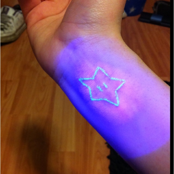 wrist tattoo star motif