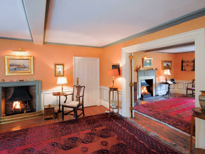 nástěnné malby nápady oranžový stěna barva koberec krb útulný