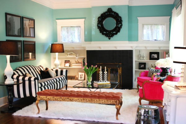 color de la pared turquesa salón de rayas sofá