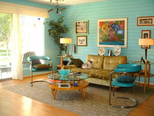 muur verf turquoise glazen tafelblad woonkamer bank