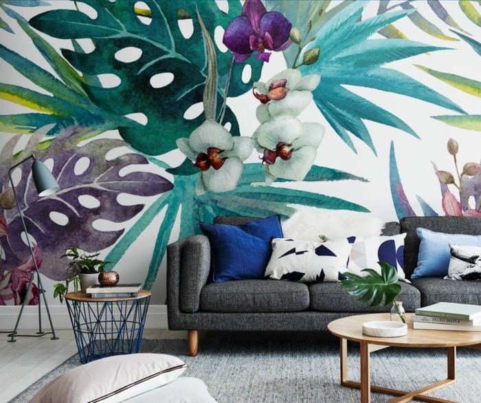 nástěnná malba obývací pokoj stěna design květinový vzor šedá pohovka světle šedá koberec
