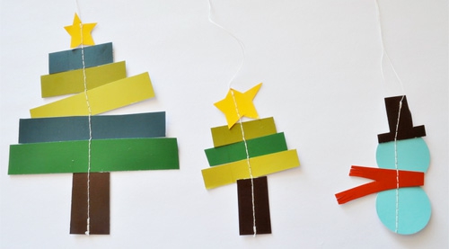 maak kerstmis baubeln met gekleurde papieren figuren