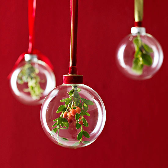 Christmas decorations make transparent balls with evergreen