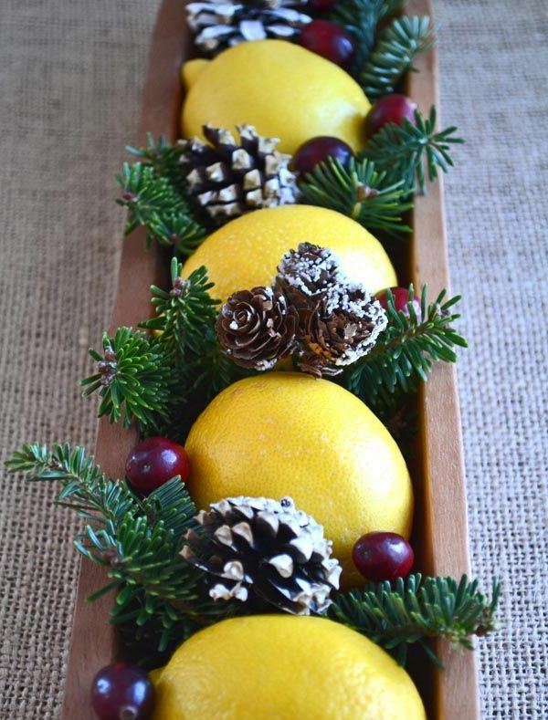 christmas decoration table decoration lemon berries cones