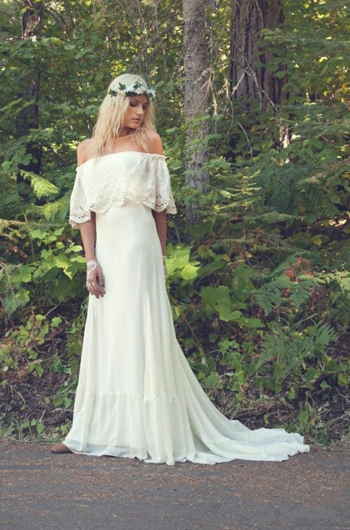 balta vestuvinė suknelė boho stilius ilgai blondinai plaukai