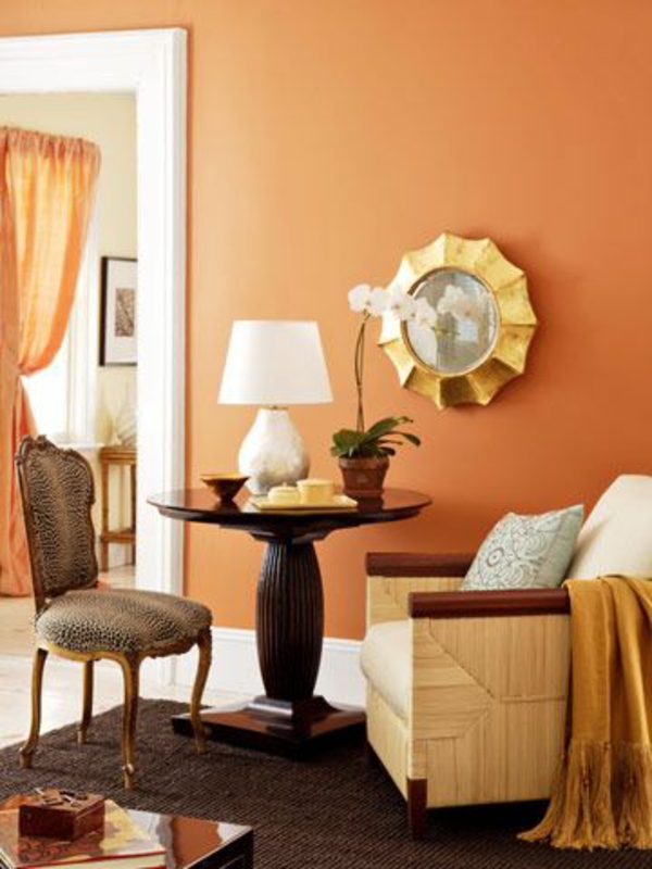 Ideas vivas para la idea anaranjada del diseño de la pared de la sala de estar