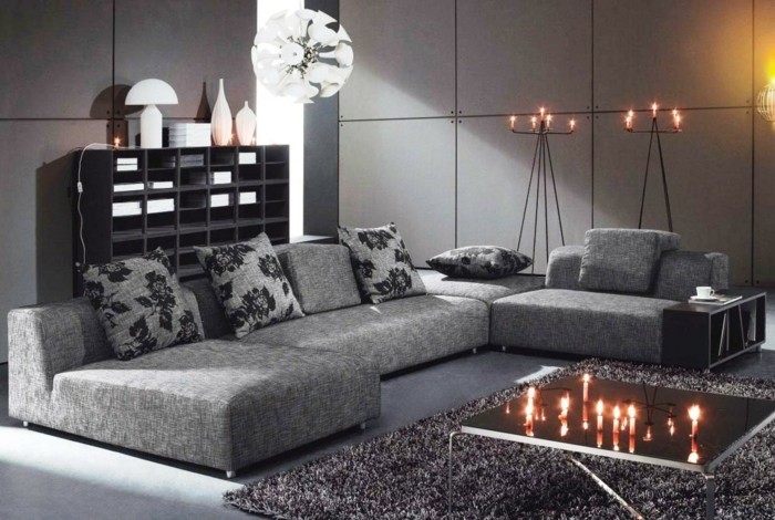 sala de estar muebles elegantes muebles paredes grises alfombras de tiro almohada velas