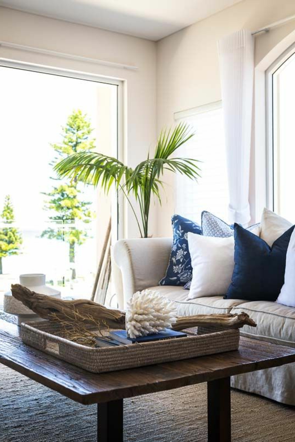 living room set up plant rustic coffee table