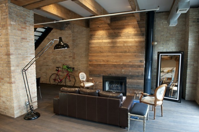 sala de estar con pared rústica, diseño interior moderno con detalles rústicos