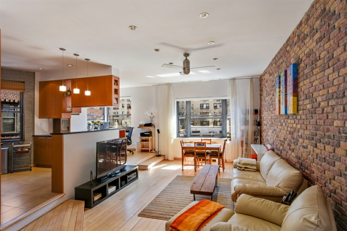 moderne stue satt opp rustikke salongbord kjøkken murvegg