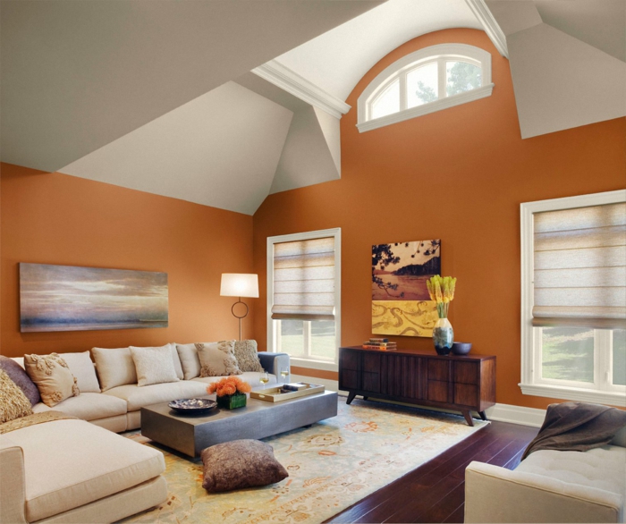 woonkamer ideeën oranje muren licht tapijt hoekbank retro dressoir