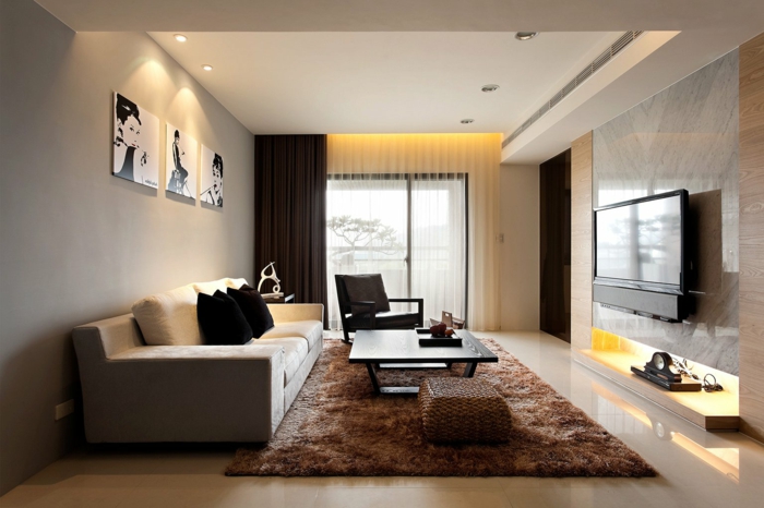 woonkamer decoratie bruin tapijt wanddecor inbouwverlichting