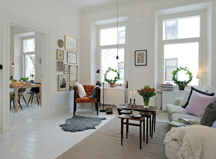 Obývací pokoj nábytek nápady skandinávský styl svíčky koberce rostlin