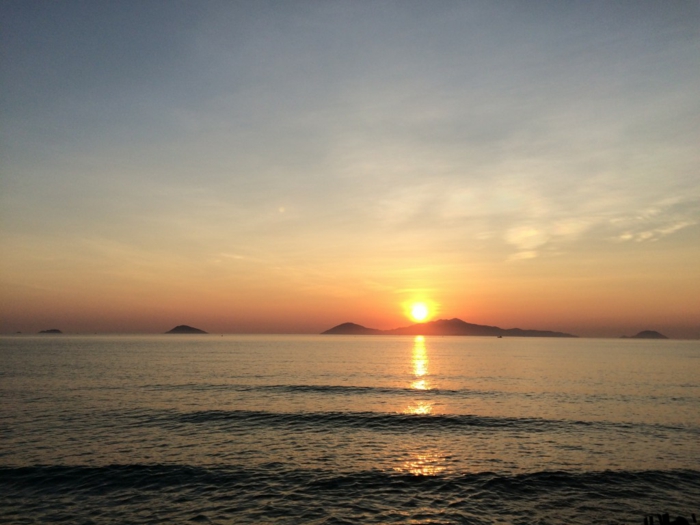 yin yang znamenat západ slunce panorama moře
