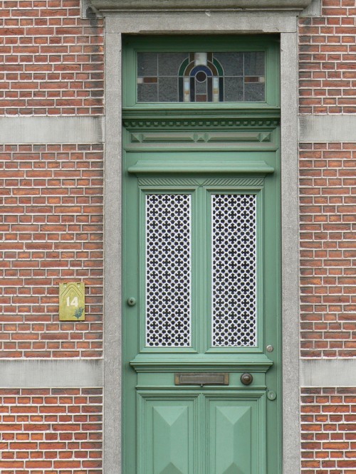 جدار من الطوب الزجاج الأخضر مشرق شاحب الأبواب الأمامية جذابة