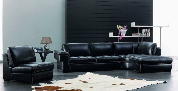 bedroom set-ideas-living room-black-leather-furniture-fur carpet-cozy