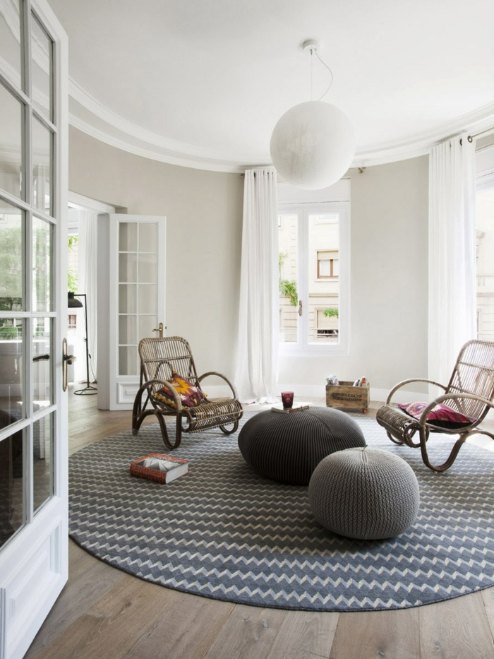 room decor ideas rug round rattan armchair